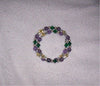 Green, yellow and purple memory wire bracelet with Swarovski crystals