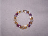 Pink, gold and clear memory wire bracelet with Swarovski crystals