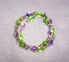 Green, yellow & purple memory wire bracelet made with Swarovski crystals