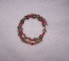 Tan and peach memory wire bracelet made with Swarovski crystals